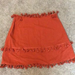 orange skirts with mini tassels